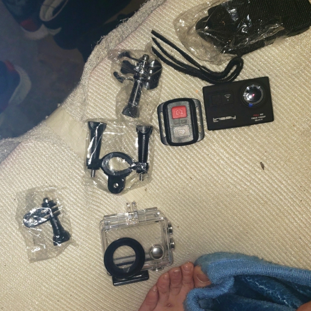 A Lindsey camera with waterproof case for it it comes with everything